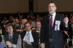 Canton Selectman Robert Burr makes a point during the 2011 MMA Annual Business Meeting on Jan. 22 in Boston.