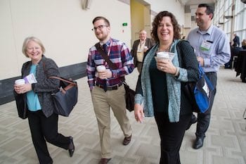 Local officials, armed with coffee, head to their next session during the 2017 MMA Annual Meeting and Trade Show.