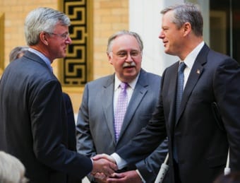Gov. Charlie Baker (right) shakes hands with former Environmental Affairs Secretary Bob Durand (left) at an Oct. 6 celebration of the Community Preservation Act as Rep. Stephen Kulik of Worthington looks on.