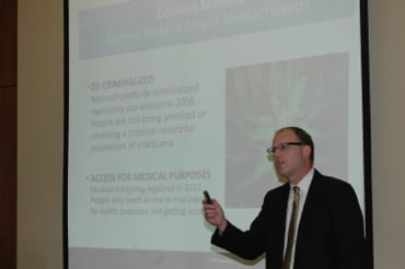 presenter shows slides on legalization of marijuana