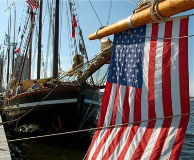 MMA 2010 photo calendar - July: âTall Ships Anchor in Boston,â Boston, by Ellen Stoolmacher