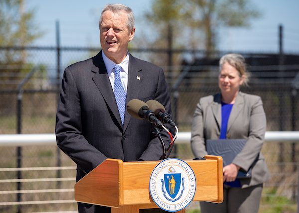 On May 18 in Salem, Gov. Charlie Baker announces the filing of a $1.7 billion supplemental budget bill for fiscal 2022. Also pictured is Energy and Environmental Affairs Secretary Beth Card. (Photo courtesy Joshua Qualls/Governor’s Press Office)