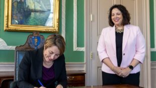Gov. signs supplemental budget with pandemic-era extensions, key investments