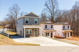 New, entry-level, single-family row houses under construction.